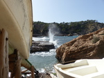 FZ028379 Big splash of waves between boats.jpg